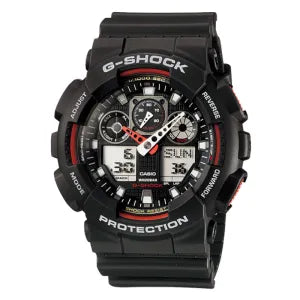 The Casio G-Shock GA-100-1A4CU from VLC Distribution Co. is a black analog-digital watch with labeled bezel buttons, shock resistance, and digital screens showing day, date, and time in a rugged design.