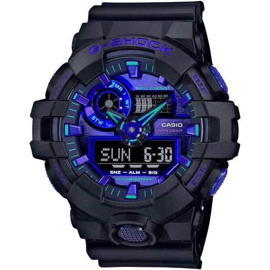 The Casio G-Shock Watch - Analog/Digital - GA700VB-1A by VLC Distribution Co. showcases bold markings, multiple side buttons, and a face with vivid blue and purple accents inspired by virtual reality aesthetics.