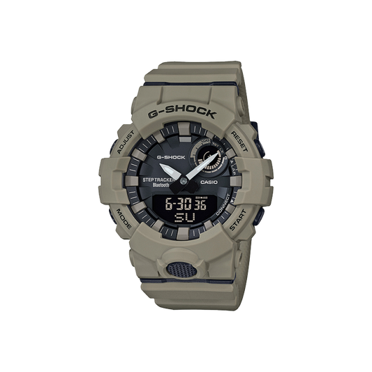 The VLC Distribution Co. Casio G-Shock Watch - Power Trainer (GBA-800UC-5A) features a beige resin band and case, black digital-analog face, multiple function buttons, and fitness support functions, shown on a plain white background.