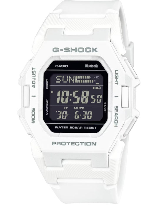 The VLC Distribution Co. G-Shock Watch - GDB500-7 is a white digital watch displaying 10:58:50 and Sunday, with Mode, Adjust, Light, and Search buttons. It offers Bluetooth connectivity and water resistance for everyday use.