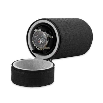 The Quality Gold Watch Winder - Black Faux Crocodile (GM8463) stands open, revealing a wristwatch inside its soft, light-colored lined interior for added protection.