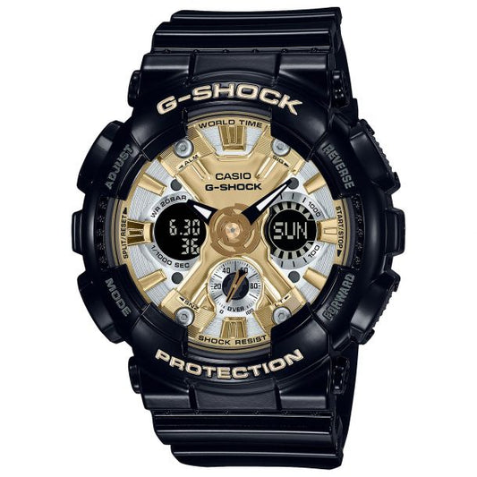 The VLC Distribution Co. G-Shock Watch - Compact Design (GMAS120GB-1A) features a black case, gold and silver accents, analog-digital displays, multiple dials, labeled edge buttons, and shock resistance for stylish durability.