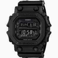 The VLC Distribution Co. G-Shock Watch - Black - GX-56BB-1CR shows the time 10:58, Sunday, and date 6-30. It has a rugged, shock-resistant square design with a protective case for lasting durability.