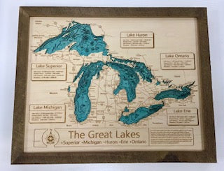The Lake Art Lake Map - Great Lakes is a 16" x 20" laser-carved wooden relief featuring the five Great Lakes in blue with engraved names and descriptions, making it a striking wall art piece for any space.