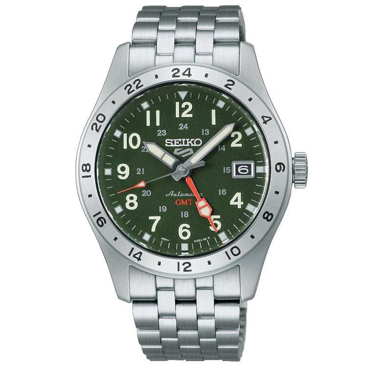 The Seiko Watch - Seiko 5 - HDB001 by Seiko is a field GMT wristwatch featuring a green dial, silver bezel, and metal bracelet. This automatic watch displays the date, has white hour markers, and features a bold red GMT hand.