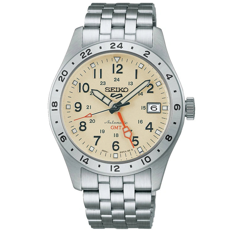 The Seiko 5 HDB002 is a classic men's wristwatch from Seiko, featuring a stainless steel case, beige dial with black hour markers, an orange GMT hand, a date window at the 3 o’clock position, and a 24-hour bezel. Its durable metal link band embodies the signature reliability and style of the renowned Seiko brand.
