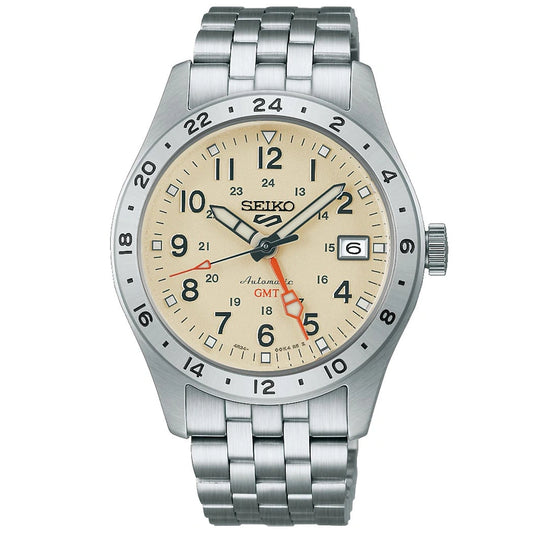 The Seiko 5 HDB002 is a classic men's wristwatch from Seiko, featuring a stainless steel case, beige dial with black hour markers, an orange GMT hand, a date window at the 3 o’clock position, and a 24-hour bezel. Its durable metal link band embodies the signature reliability and style of the renowned Seiko brand.
