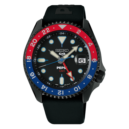 The Seiko 5 x Pepsi® Limited Edition SSK047 automatic watch by Seiko features a black dial, blue/red bezel with 24-hour numerals, black strap, silver hands, date window at 3 o’clock, and SEIKO and PEPSI GMT branding on the dial.
