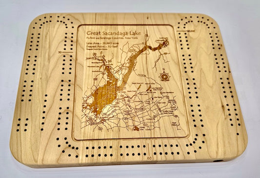 Lake Art’s Lake Gifts - Great Sacandaga Lake Cribbage Board features a detailed map of the lake with fun facts, surrounded by cribbage scoring holes—making it the perfect lake-themed gift.