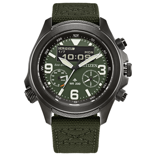 The Citizen Watch - Promaster Land U822 (JV1005-02W) by Citizen features a dark green fabric strap, black stainless steel case, analog and digital displays, multiple dials, and shows 10:09 and Monday, 1/7—adventure-ready style.
