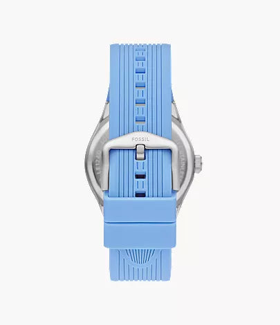 A close-up of the blue silicone strap and silver buckle with FOSSIL branding on the Limited Edition Fossil Watch - Big Tic Argentina (LE1240); watch face not visible.
