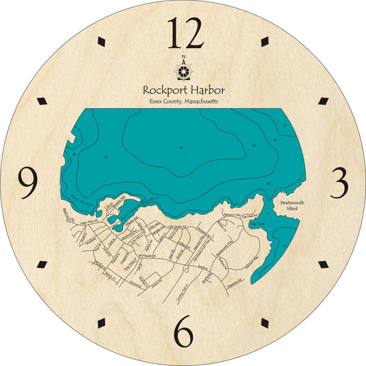 The Lake Art Lake Clock - Rockport Harbor features a custom wooden face with a detailed map of Rockport Harbor, MA, numbered hours on the edge, and an intricate outline of the harbor and local streets in the center.