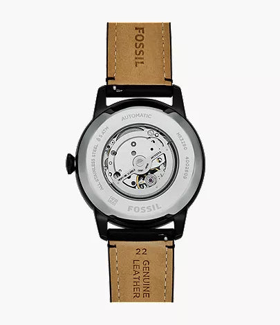 Back view of a Fossil Watch - Townsman - ME3290 with a black case, tan leather strap, and a clear exhibition case back displaying the movement.