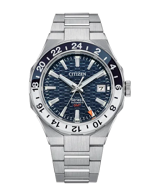 The Citizen Watch - Series8 880 GMT (NB6034-58L) features a stainless steel case, blue textured dial, silver markers, date at 3 o’clock, 24-hour GMT bezel, silver bracelet, and an orange-tipped GMT hand.