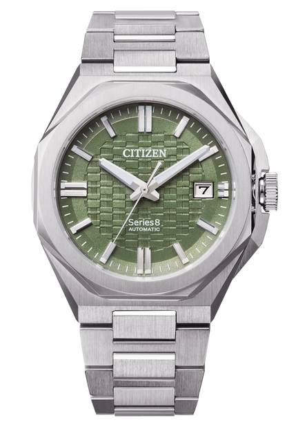The Citizen Watch - Series 8 - NB6080-51W is a sport-luxury automatic watch with a silver stainless steel band, green textured dial, silver hands, white markers, and a date window at 3 o’clock.