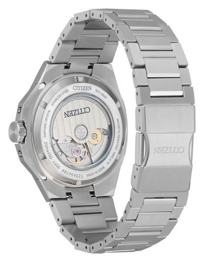 A close-up of the Citizen Watch - Series 8 - NB6080-51W displays its transparent case back, revealing the automatic movement and engraved details around the edge.