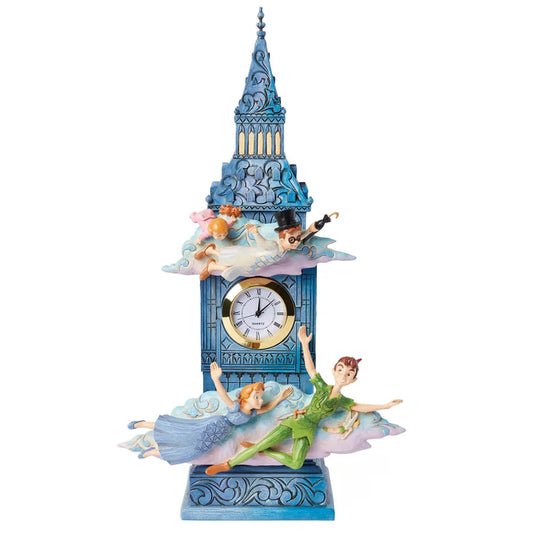 The Enesco Disney Time to Find Neverland (6015025) clock features Peter Pan characters flying around clouds near a Big Ben-shaped face—a vibrant Jim Shore collectible perfect for any Neverland fan.