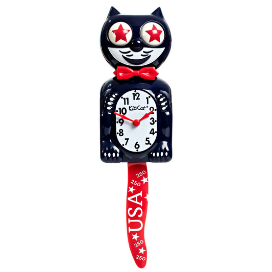 The Kit-Cat Klock - Old Glory Special Edition (BC-250) by California Clocks is a black, cat-shaped wall clock featuring star-shaped eyes, a red bowtie, and a red tail adorned with “USA” and “250.” This special edition celebrates America’s 250th Anniversary. The clock face displays “Kit Cat” and shows the time as 1:05.