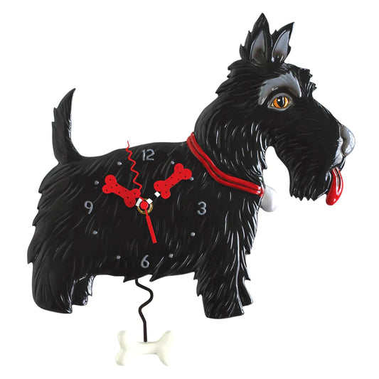 The Enesco Allen Designs Clock - Scottie Clock (P1762) features a black Scottish Terrier shape with a red collar, red bone-shaped hands, and a white bone pendulum. A playful tongue detail makes this unique clock come to life.