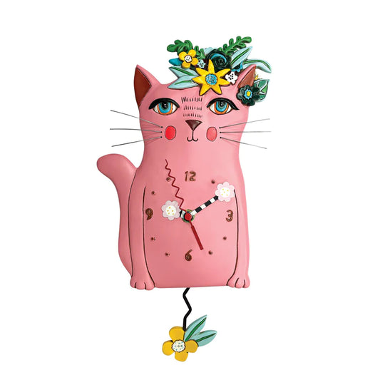The Enesco Allen Designs Clock - Pretty Kitty Pink (P2160) features a cat shape with green eyes, floral accents, a flower pendulum, and black and white striped hands on a white face.