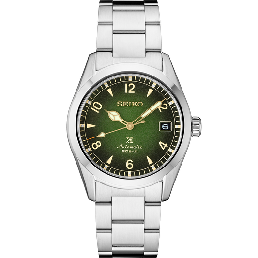The Seiko Watch - Prospex Alpinist - SPB155 features a stainless steel band, green dial, gold hands and markers, date window at 3 o’clock, and “Automatic 20BAR” text above 6 o’clock.