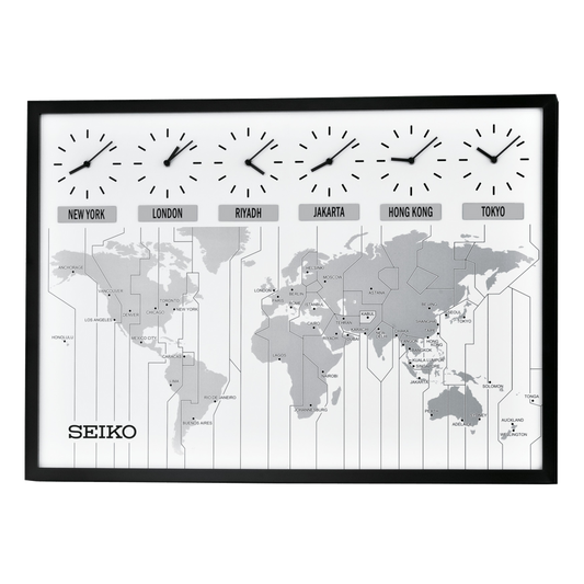 The Seiko Clock - World View Wall Clock (QXA538KLH) by Seiko features a large wooden frame with six clocks for New York, London, Riyadh, Jakarta, Hong Kong, and Tokyo above a gray global time zone map.
