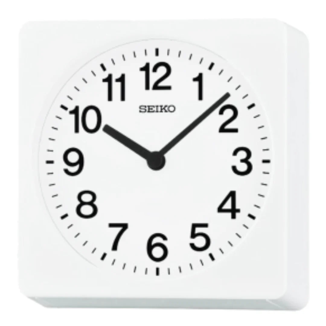 A white Seiko Clock - Desk/Wall Clock - QXA860W displays the time as 10:08. This elegant clock by Seiko features black numerals and sleek black hour and minute hands on a crisp white square background.