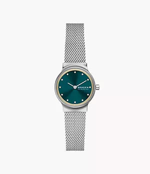 The Fossil Skagen Watch - Freja Lille - SKW3188 features a silver mesh strap, a round teal dial with elegant gold hour markers, and the brand name Skagen Denmark displayed on the face.