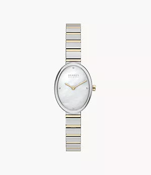 The Fossil Skagen Watch - Anita Oval - SKW3198 features a silver and gold oval-shaped design, a white dial with minimal hour markers, and a slim bracelet-style band.