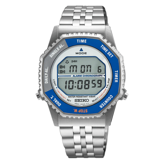 The Seiko Watch - Rotocall - SMGG21 features a silver metal band, blue/silver bezel, rectangular display showing time, date (“Mon 6”), alarm, and chronograph (10:08:59), inspired by the 1982 Rotocall series. Brand: Seiko.