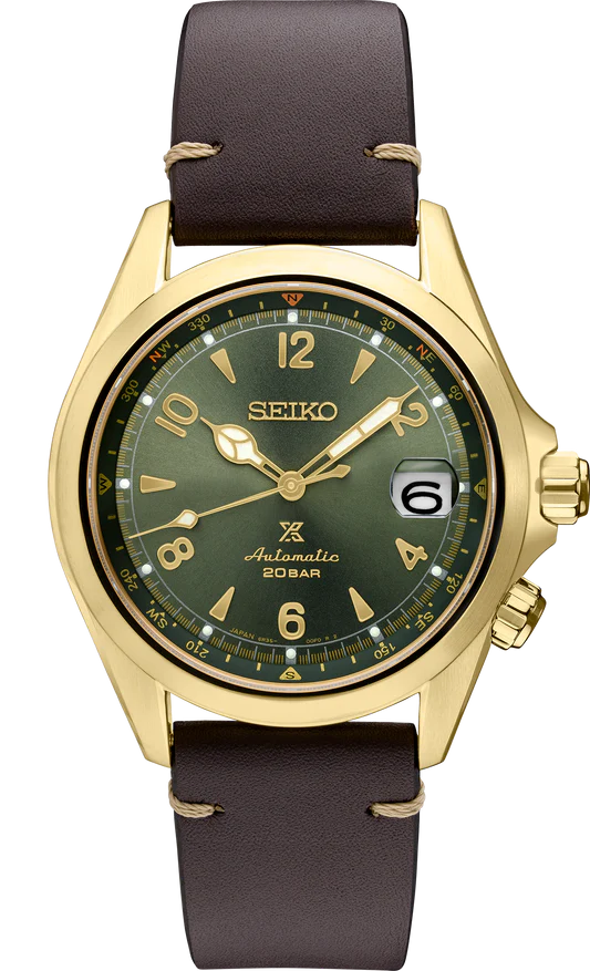 The Seiko Prospex Luxe Alpinist SPB210 features a gold case, green dial, brown leather strap, gold-tone hands/markers, date at 3 o’clock, and “Automatic 20BAR” above 6—showcasing its automatic movement and water resistance.