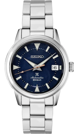 The Seiko Watch - Prospex Alpinist SPB249 from Time Square Clock Shop features a blue textured dial, silver markers and hands, date at 3 o’clock, automatic 20BAR movement, and a stainless steel bracelet—built for adventure.
