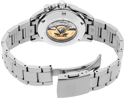 A close-up of the Seiko Prospex Luxe Alpinist SPB505 watch highlights its open stainless steel bracelet, see-through case back, and visible gold-accented automatic movement—an ideal choice for outdoor adventurers.