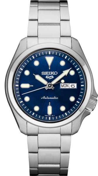 The Seiko Watch - Seiko 5 Sports - SRPE53 by Seiko features a blue dial, silver markers and hands, day-date display at 3 oclock, stainless steel case, and a metal link bracelet.