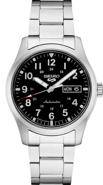 The Seiko Watch - SRPG27 from the Seiko 5 Sports Collection features a silver band, black dial with white numerals and hands, red-tipped second hand, and day-date display at 3 o’clock.