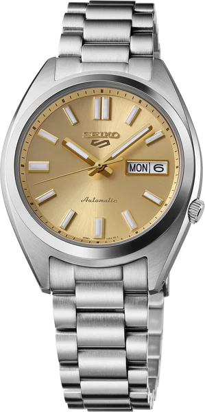 The Seiko 5 Sports SRPL59 by Seiko is a silver stainless steel automatic watch featuring a gold dial, silver markers and hands, day-date display at 3 o’clock, and "Automatic" above 6 o’clock.