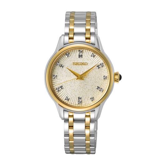 A two-tone stainless steel Seiko watch with a diamond-accented ivory dial and a gold-tone bracelet.