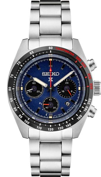 The Seiko Prospex Speedtimer Solar Chronograph SSC913 features a blue dial, three sub-dials, date window, black bezel with red tachymeter scale markings, and a sleek stainless steel bracelet.