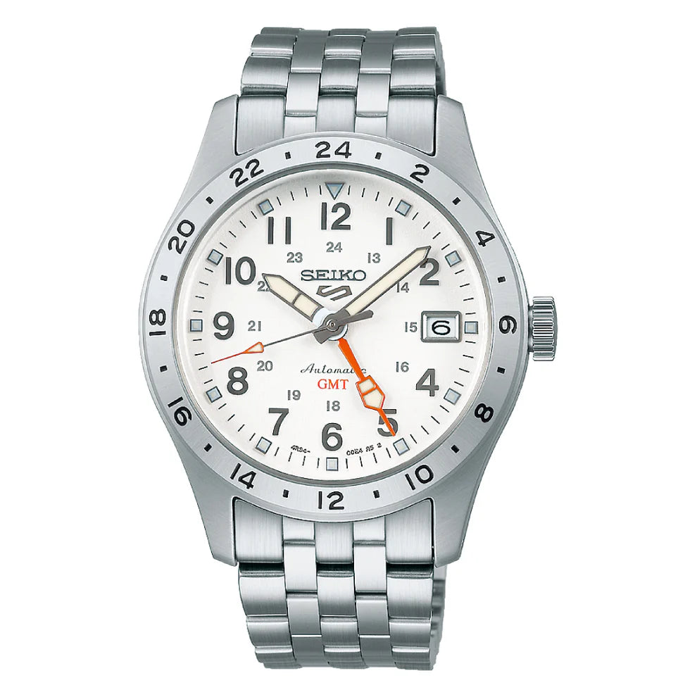 The Seiko Watch - Seiko 5 GMT - SSK059 by Seiko is an automatic GMT watch with a stainless steel band and case, white dial, black markers, orange GMT hand, date at 3 o’clock, and a bezel with a bold 24-hour scale.