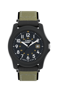 The Timex Watch - Camper - T425719J features a black case, black dial with white numerals and yellow accents, date window at 3 o’clock, and olive green fabric strap. This rugged quartz analog watch provides reliable three-hand timekeeping.