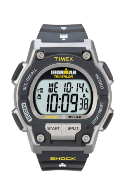 The Timex Watch - Ironman C30 (model T5K1959J) from Timex shows 10:09:38 and 10-14, featuring a rugged black and gray design with labeled buttons plus yellow and white text.