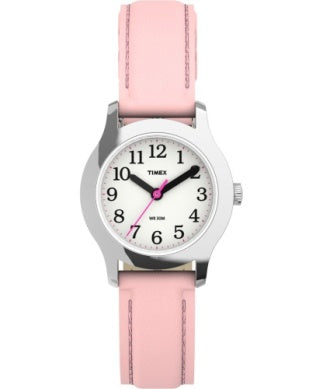 The Timex Watch - Time Teacher - T790819J by Timex features a silver case, white dial with black numerals, pink minute hand, highlighted pink 7, and a light pink leather strap—perfect for kids learning to tell time.