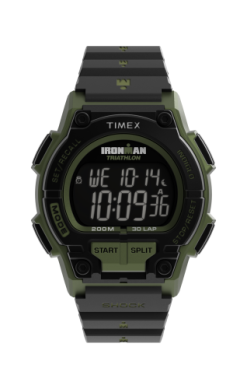 The Timex Ironman Shock Endure (model TW5M649009J) is a black and green digital wristwatch displaying 10:09:36 and Wednesday 10/14, with multiple function buttons around the screen.