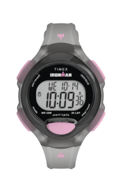 The Timex Watch - Ironman Essential (TW5M657009J) by Timex features a grey and pink design, displays 10:09:36 and Wednesday 10-14, and offers Indiglo light plus a 30-lap memory.