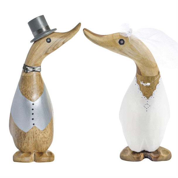 The Enesco DCUK Ducks - Duckling Wedding Set (6018582) features two wooden ducklings dressed as bride and groom—a delightful newlywed gift or a charming addition to any wedding duck collection.