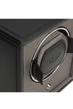 Close-up of the Wolf - Watch Winder - 455203, showing its black pebble finish, circular padded interior, and WOLF branding embossed on the central cushion.