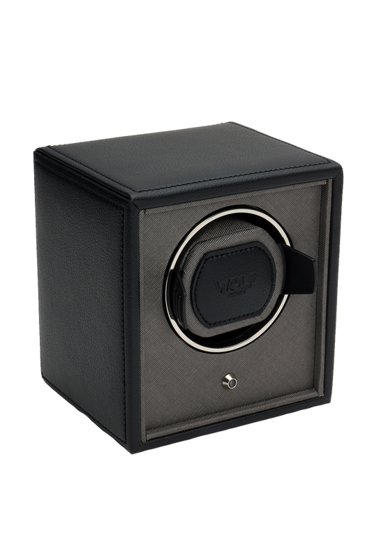 The Wolf Watch Winder (model 455203) by Wolf features a black pebble finish and a square black and gray design with a circular holder inside for automatic watches, pictured against a plain white background.