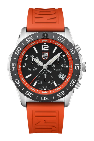 The Luminox Pacific Diver Chronograph XS.3149 is a Swiss-made diver watch with a red rubber strap, black and silver bezel, black dial, white hour markers, three subdials, date window, and bold white numerals at 12, 4, and 8 o’clock.