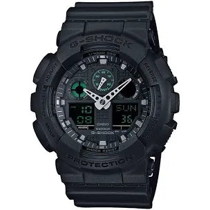 The VLC Distribution Co. G-Shock Watch - Matte Black - GA100MB-1A is a shock-resistant wristwatch featuring both analog and digital displays, a sturdy resin band, and a rugged, durable design. Display shows 1:50 and Sunday, the 31st.