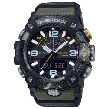 The Casio G-Shock Watch - Mudmaster GGB100-1A3 by VLC Distribution Co. features a black and green shock resistant carbon fiber case, digital/analog display, multiple buttons and sensors, and labels like Sensor, Mud Resist, and G-Shock.